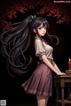 A girl with long black hair standing next to a table with a candle.